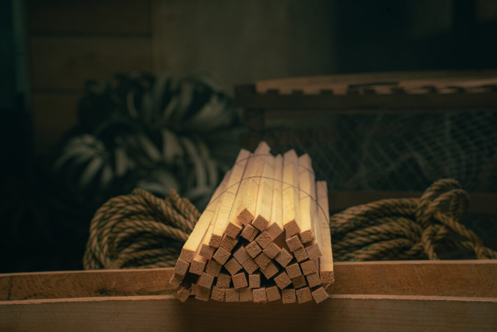 Wood trap headsticks bundled together for lobster trap construction