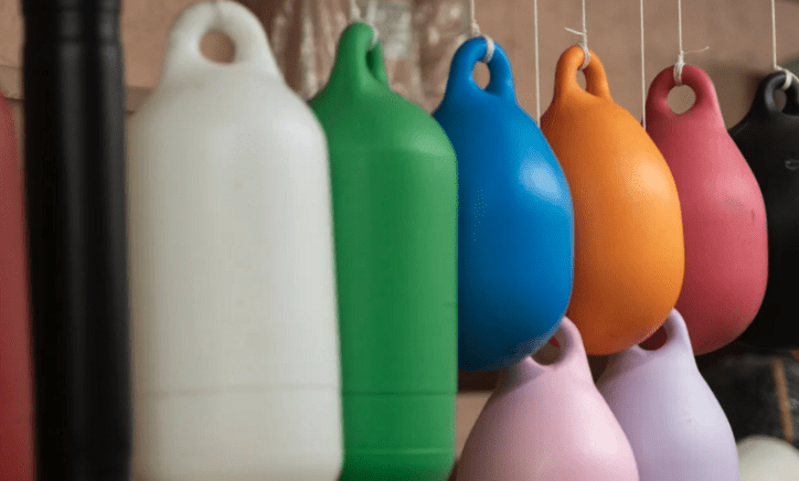 Colorful fishing buoys hanging for lobster trap marking in coastal fishing